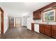 Open kitchen with wooden cabinets and a view of the living area at 2307 Woodridge Dr, Marietta, GA 30066