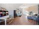 Bonus room featuring wood floors, craft table, and natural lighting at 374 Meadowmeade Cv, Lawrenceville, GA 30043