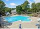 Resort-style community pool, perfect for relaxation and recreation on a sunny day at 374 Meadowmeade Cv, Lawrenceville, GA 30043
