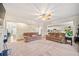 Bright living room with hardwood floors, two sofas, and an open floor plan at 374 Meadowmeade Cv, Lawrenceville, GA 30043