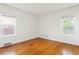 Bright bedroom with hardwood floors, two large windows, and natural light at 479 Shannon Sw Dr, Atlanta, GA 30310