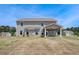 Expansive backyard with a covered porch, perfect for outdoor entertaining at 119 Felicity Pike, Locust Grove, GA 30248