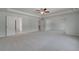 A spacious bedroom with connecting rooms for easy access and flow at 119 Felicity Pike, Locust Grove, GA 30248