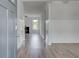 Inviting home entryway with hardwood floors and stylish wall paneling at 119 Felicity Pike, Locust Grove, GA 30248