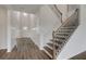 Stunning two-story foyer with hardwood floors and an elegant staircase at 119 Felicity Pike, Locust Grove, GA 30248