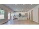 Modern kitchen with white cabinets, an island and stainless steel appliances at 119 Felicity Pike, Locust Grove, GA 30248