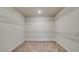 Spacious walk-in closet with wire shelving at 119 Felicity Pike, Locust Grove, GA 30248