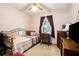 Bedroom with a single bed and natural light at 1292 Marcelle Heights Nw Pl, Norcross, GA 30093