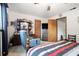 Bright bedroom with a ceiling fan, natural light, and closet space, providing a serene and organized retreat at 1292 Marcelle Heights Nw Pl, Norcross, GA 30093