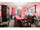 Formal dining room features a large table, ornate mirror, chandelier, and traditional furnishings at 1292 Marcelle Heights Nw Pl, Norcross, GA 30093