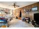 Charming living room with wood paneling, plush carpet, and staircase, creating a welcoming and warm living space at 1292 Marcelle Heights Nw Pl, Norcross, GA 30093