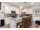 Modern kitchen with white cabinets, granite countertops, and stainless steel appliances, perfect for culinary enthusiasts at 1868 Fabian Way, Austell, GA 30106