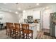 Bright kitchen featuring a spacious island with bar seating, stainless steel appliances, and ample cabinet space at 1868 Fabian Way, Austell, GA 30106