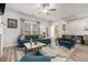 Inviting living room with modern furniture, large windows, and open layout, ideal for relaxation and entertainment at 1868 Fabian Way, Austell, GA 30106