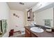 Cozy bathroom features a single vanity with a large mirror, white toilet and neutral tones at 2340 Castleridge Ct, Tucker, GA 30084