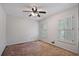 A light-filled bedroom featuring shuttered windows and ample space at 2340 Castleridge Ct, Tucker, GA 30084