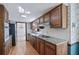 Spacious kitchen with granite countertops, wood cabinets, stainless steel appliances and hardwood flooring at 2340 Castleridge Ct, Tucker, GA 30084
