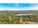 A captivating aerial shot highlights the property's location amidst lush greenery and scenic views at 27 Friendship Rd, Euharlee, GA 30145