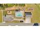An aerial view depicts a community pool and amenities, including a playground and ample parking at 27 Friendship Rd, Euharlee, GA 30145