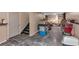 Spacious basement area with tile flooring, storage, and a stairway at 27 Friendship Rd, Euharlee, GA 30145