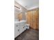 Bathroom with vanity, toilet, and shower with golden colored curtain at 27 Friendship Rd, Euharlee, GA 30145