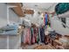 Walk-in closet with open shelving, clothing racks, and ample storage at 27 Friendship Rd, Euharlee, GA 30145