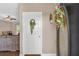 View of the entry door into the house with a glimpse of the living room beyond at 27 Friendship Rd, Euharlee, GA 30145
