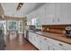 Kitchen area with stainless appliances, a breakfast nook and wood-look laminate flooring at 27 Friendship Rd, Euharlee, GA 30145