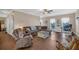 Spacious living room features laminate wood flooring and comfortable seating at 27 Friendship Rd, Euharlee, GA 30145