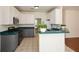 Well-maintained kitchen with stainless steel appliances, and green countertops at 3239 Rose Petal Ln, Powder Springs, GA 30127