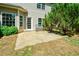 Outdoor patio area with space for seating, complemented by mature landscaping at 3239 Rose Petal Ln, Powder Springs, GA 30127
