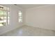 Bright room with large windows and tile flooring, perfect for a home office or den at 3239 Rose Petal Ln, Powder Springs, GA 30127