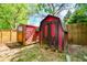 Two storage sheds in the backyard with ample space for outdoor equipment at 3239 Rose Petal Ln, Powder Springs, GA 30127