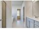 Bathroom featuring a standing shower, soaking tub and vanity at 123 Felicity Pike, Locust Grove, GA 30248