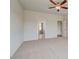 Spacious bedroom with ceiling fan and two entryways at 123 Felicity Pike, Locust Grove, GA 30248