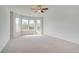 Spacious bedroom with bay window and neutral carpet at 123 Felicity Pike, Locust Grove, GA 30248