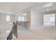 Open loft space on the second floor with views to the lower level and outside at 123 Felicity Pike, Locust Grove, GA 30248