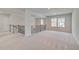 Open loft space on the second floor with views to the lower level and outside at 123 Felicity Pike, Locust Grove, GA 30248
