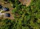 Beautiful aerial view of property showcasing the mature trees and desirable lot at 19 Four Feathers Ne Ln, Rydal, GA 30171