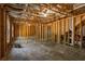 Unfinished basement area with exposed beams and concrete floors, offering potential for customization and additional living space at 19 Four Feathers Ne Ln, Rydal, GA 30171