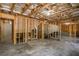Unfinished basement with exposed framing, offering a blank canvas for customization at 19 Four Feathers Ne Ln, Rydal, GA 30171