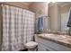 Well-maintained bathroom featuring a vanity with granite countertops and shower with tub at 19 Four Feathers Ne Ln, Rydal, GA 30171