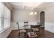 Dining room featuring a modern chandelier and room for seating to host dinner guests at 19 Four Feathers Ne Ln, Rydal, GA 30171