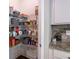 Organized walk-in pantry featuring wire shelving, and plenty of room for groceries and storage at 19 Four Feathers Ne Ln, Rydal, GA 30171