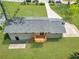 Aerial view showcasing backyard, deck, driveway, and manicured lawn at 2793 Horse Shoe Dr, Atlanta, GA 30316