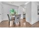 Dining room featuring a modern table set, hardwood floors, and bright natural light at 2793 Horse Shoe Dr, Atlanta, GA 30316