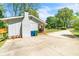 Exterior of the house with a long driveway, white trim, and well-kept landscaping at 2793 Horse Shoe Dr, Atlanta, GA 30316
