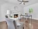 Cozy office featuring hardwood floors, a fireplace, and a modern desk at 2793 Horse Shoe Dr, Atlanta, GA 30316