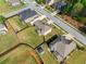 Aerial view showing neighborhood homes with spacious backyards and privacy fences at 4689 Shire Dr, Lithonia, GA 30038
