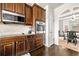 Modern kitchen with stainless steel appliances, granite countertops, and ample cabinet space for storage and meal prep at 4689 Shire Dr, Lithonia, GA 30038